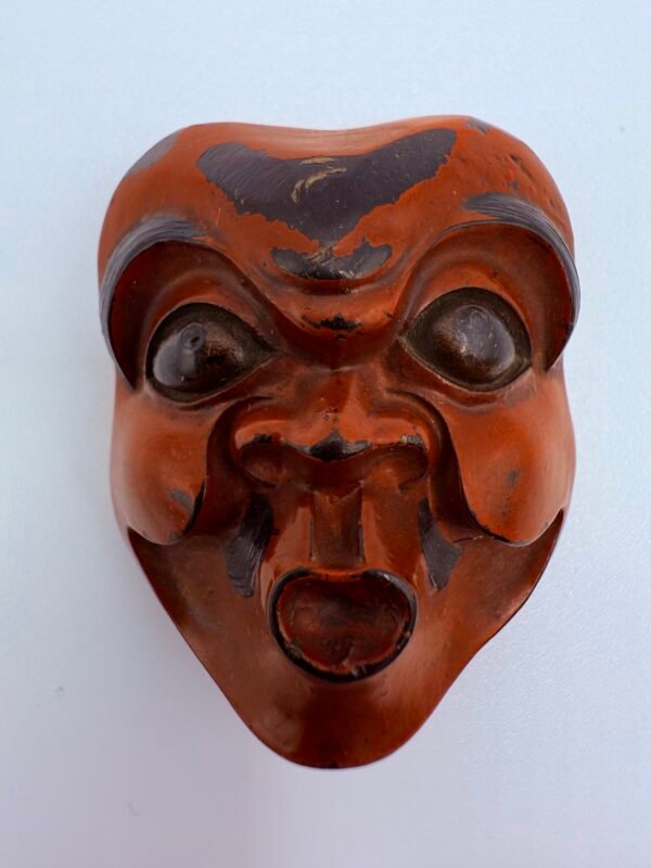 Netsuke Demon Mask, Lacquered Boxwood, Meiji period, Japan, 19th Century